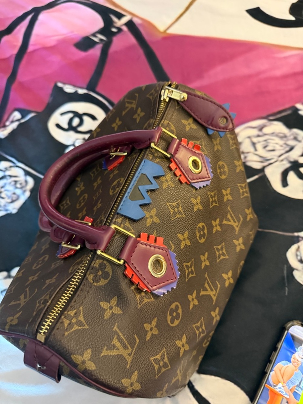 Louis Vuitton Brown Monogram Alma with Burgundy Handles and Multicolor Hardware